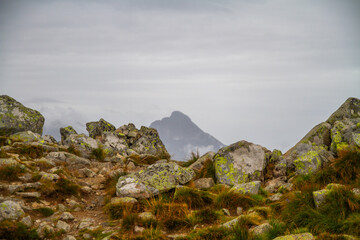 Beautiful mountain landscape with clouds and fog. 