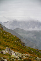 Beautiful mountain landscape with clouds and fog. 