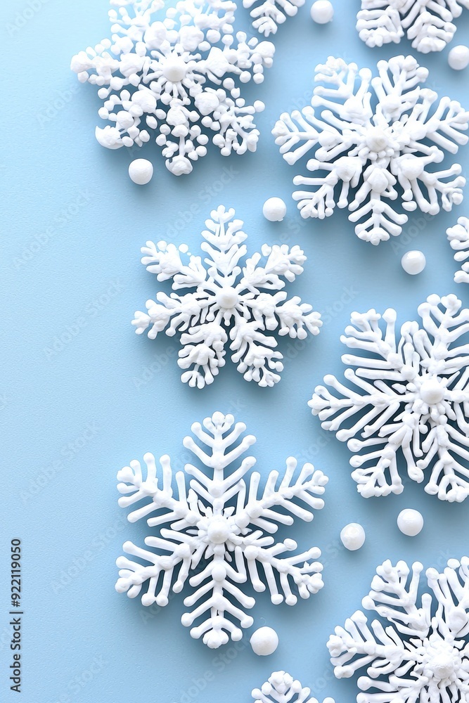 Wall mural White Snowflakes on Light Blue Background