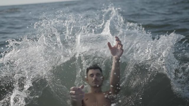 Man falls into water in slow motion