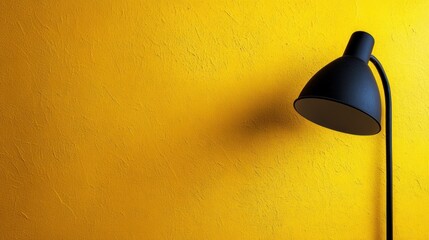 Black Desk Lamp on Yellow Wall