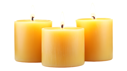 Pillar candles with flames illuminated, isolated on white background