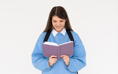 Fototapeta premium Photo of optimistic cute long hairdo lady reading book wear spectacles blue sweatshirt isolated on white color background