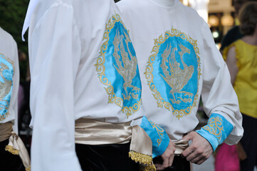 Dancers wearing one of the traditional folk costume from Republic of Kazakhstan