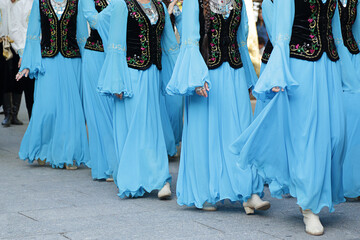 Dancers wearing one of the traditional folk costume from Republic of Kazakhstan