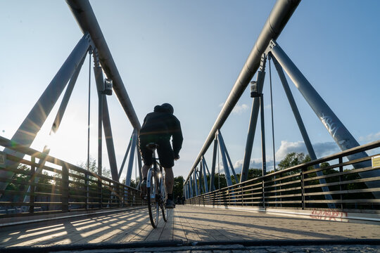 This bridge in Helsinki Finland allows people to safely cross the capital city's network of railroad tracks near its main railway station.