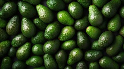 Avocado background. Top view of fresh green avocados.