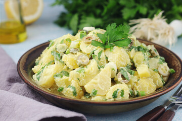 A bowl with Greek potato salads