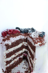 chocolate cake with raspberries and blueberries