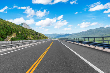 Countryside highway in a beautiful mountainous area.