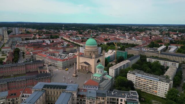 Potsdam city center with historical buildings on a sunny summer day in brandenburg, germany. Great aerial view flight descending drone