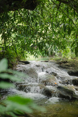 The beautiful waterfall named Namtok Chet Sao Noi is located in Saraburi province in central Thailand. It is popular among the local residents.