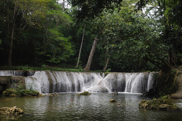 The beautiful waterfall named Namtok Chet Sao Noi is located in Saraburi province in central Thailand. It is popular among the local residents.