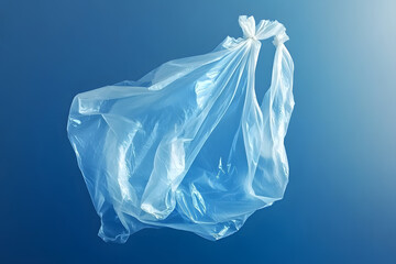 Fototapeta premium floating plastic bag on a blue background
