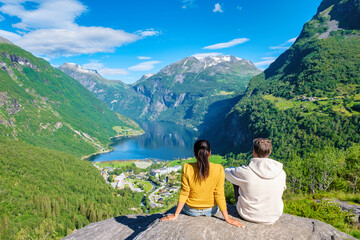 Norwegian Fjord Views From a Mountaintop, couple at Geiranger Fjord Norway