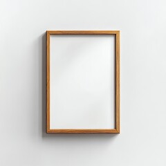 Empty wooden frame on white wall.