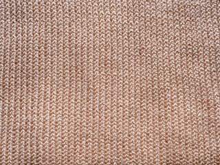 top view beige knitted wool fabric closeup texture background