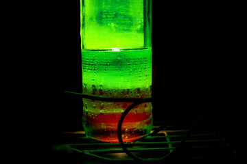 Drink bottles with green light in the dark