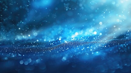 Abstract blue blurry unfocused sparkle glitter blue bokeh background wallpaper with copy space. Blue Christmas glitter design background.