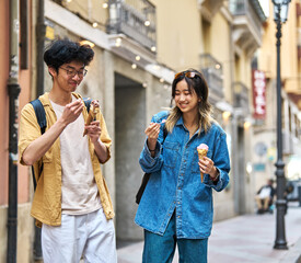 city young woman travel tourist outdoor couple happy vacation lifestyle holiday street summer urban tourism traveler town journey trip ice cream dessert food