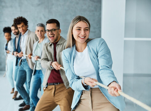 businessman man business young busineswoman woman office rope concept competition pull strength challenge teamwork effort pulling rivalry power struggle determination achievement startup - Powered by Adobe
