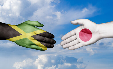 Japan and Jamaica country handshaking with flags, consensus concept international co-operation illustration