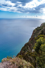 View of the ocean and coastline from the glass-floored Cabo Girao lookout on Madeira Island