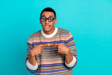 Photo of nice young man touch fingers bite lips wear sweater isolated on teal color background