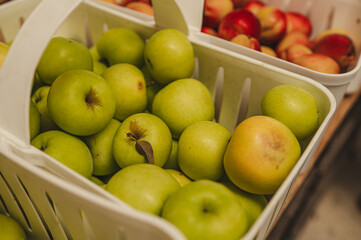 Green Apples in bushel baskets at the farmers market