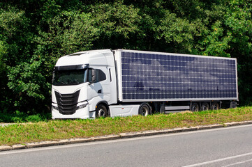 White generic semi truck with solar panel trailer, eco transport