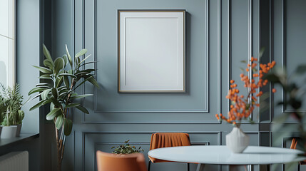 A minimalist dining room with a large framed picture, a round table, and two chairs.