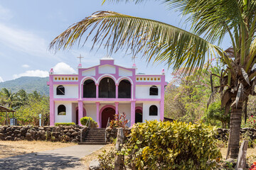 Little colorful pink church at Ometepe island in Lake Cocibolca in southwest Nicaragua Central...