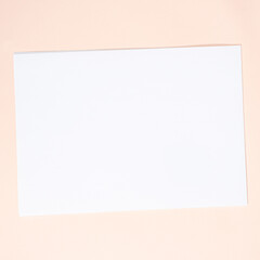 Blank Sheet of Paper on Beige Background, Top View, Space for Text