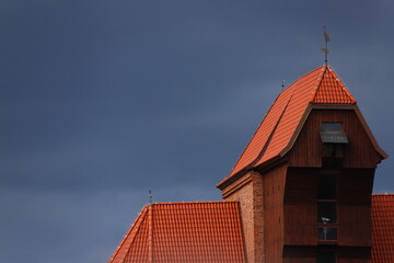 view of the Crane in the old town of Gdansk with a dark blue sky in the background