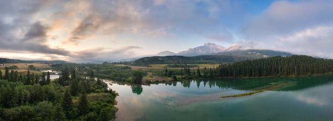 Lake in Canadian Mountain Landscape. Dramatic Sunrise Sky