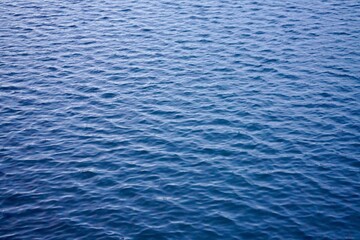 View of rippling blue water surface at a daytime