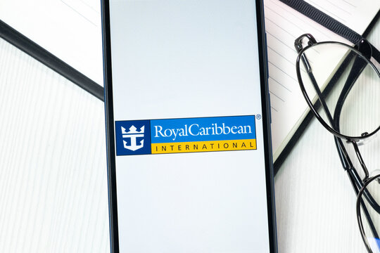 New York, USA - 10 August 2024: Royal Cribbean Logo on Phone Screen, Company Icon on Display