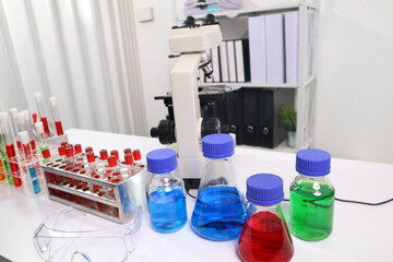 Scientific experimental equipment placed on a table in a lab.