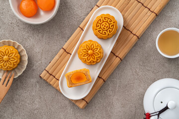 Cantonese moon cake for Mid-Autumn Festival food mooncake on gray table background.