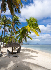 Paradise beach on a warm sunny day in Flic en Flac, Mauritius, Africa.