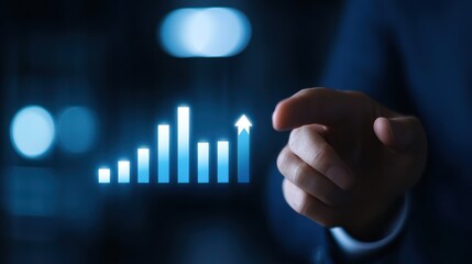 A businessman points at a digital graph representing growth and success, highlighting financial progress in a modern setting.