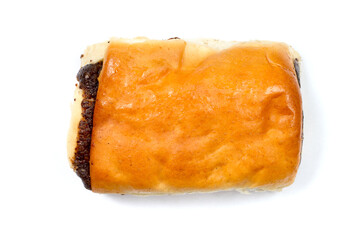Rectangular bun with poppy seeds on a white background.
