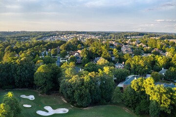 Aerial view of an upscale subdivision in suburbs of USA shot in HDR during Golden hour