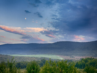 Wonderful landscape view on the Carpathian Mountains during the sunset in the summer season 