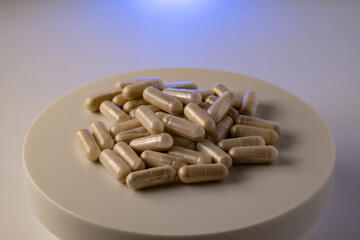 pills supplement drug vitamin on plate
