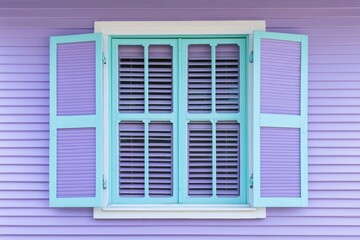 Fototapeta premium Window Hurricane. Colorful Pastel Shutters on Bungalow's Window in Seaside, Florida Beach Cottage