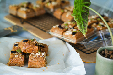A bar of oat flakes, with bananas, nuts, dried fruits and honey. Healthy food.