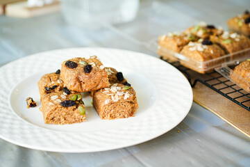 A bar of oat flakes, with bananas, nuts, dried fruits and honey. Healthy food.