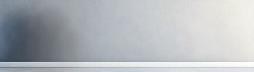 Minimalistic background showcasing a smooth, light-colored wall ideal for presentations or creative projects.