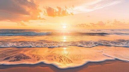 A golden sunset casts its glow over the ocean, where waves gently lap at a sandy beach. The sky is filled with soft, wispy clouds.